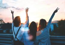 건강한 라이프스타일을 위한 첫 걸음: 식습관과 운동 photo of three women lifting there hands